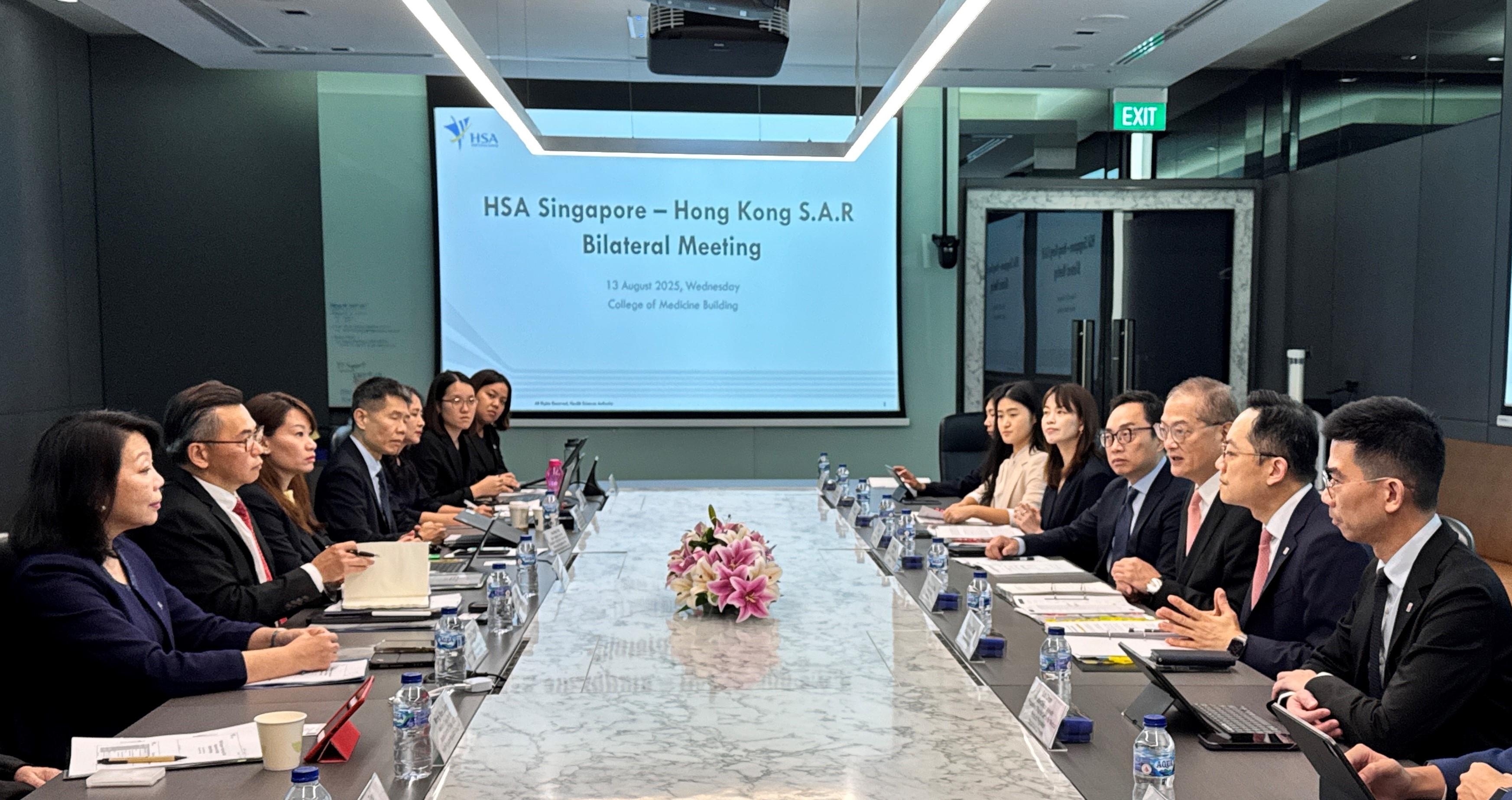 Secretary for Health continues visit to Singapore (with photos)